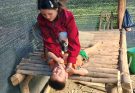 The angry mother punished the boy when he was naughty.Orphan Boy / Vinh