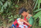 Single pregnant mother helps orphan boy.