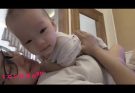 single mom breafeading a baby.
